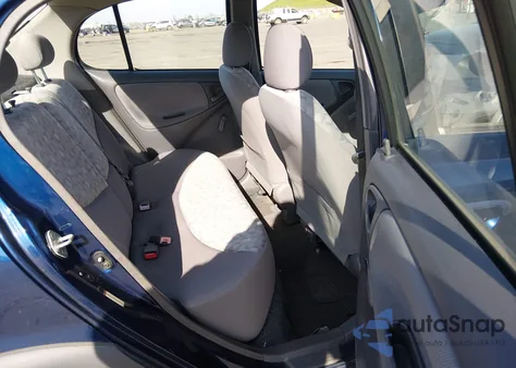 2001 Toyota Echo из США, поврежденный, VIN JTDBT123010124882